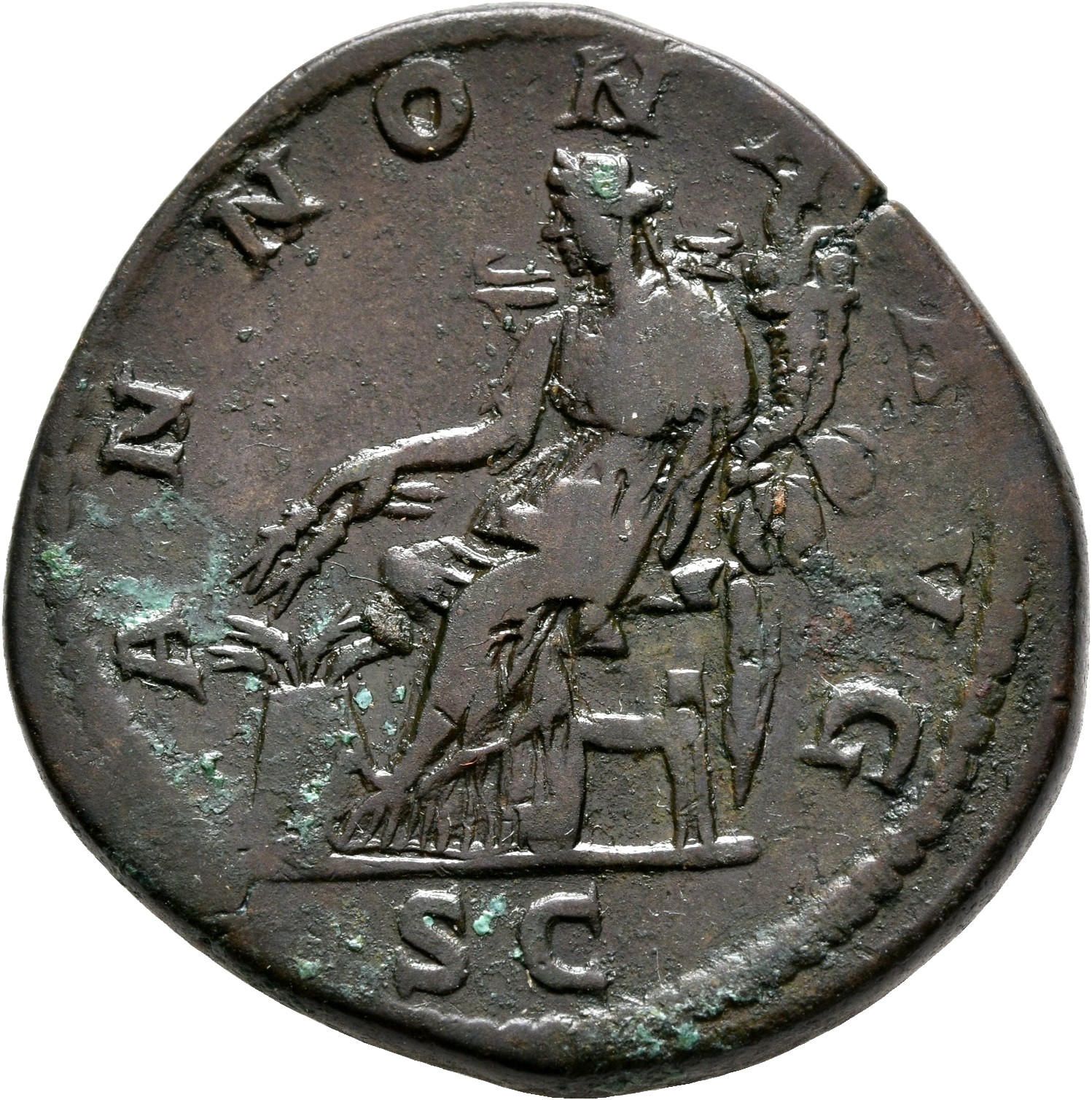 RIC IV Macrinus 169 Macrinus reverse, Annona, draped, seated left, holding corn-ears in right hand and cornucopiae in left...