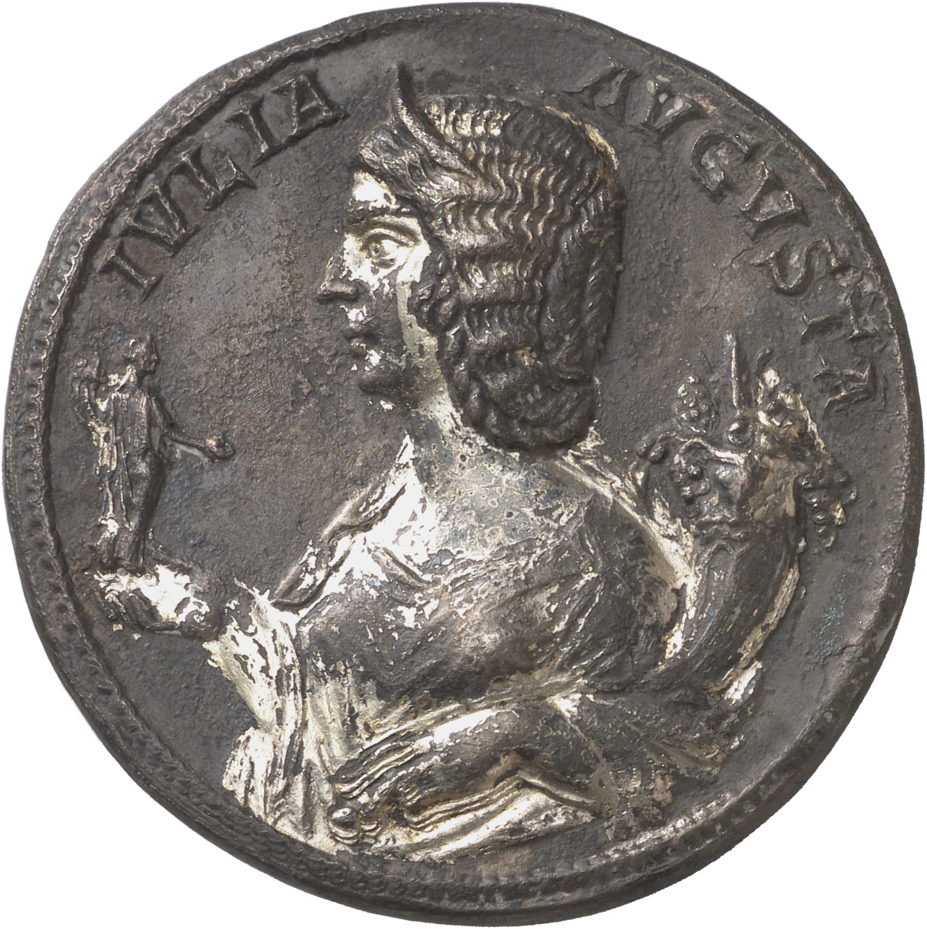 Septimius Severus obverse — Half-length bust of Julia Domna, hair waved and coiled at back, diademed, draped, left, holding statuette of Concordia, holding patera and double-cornucopiae, in right hand and holding cornucopiae in left arm
