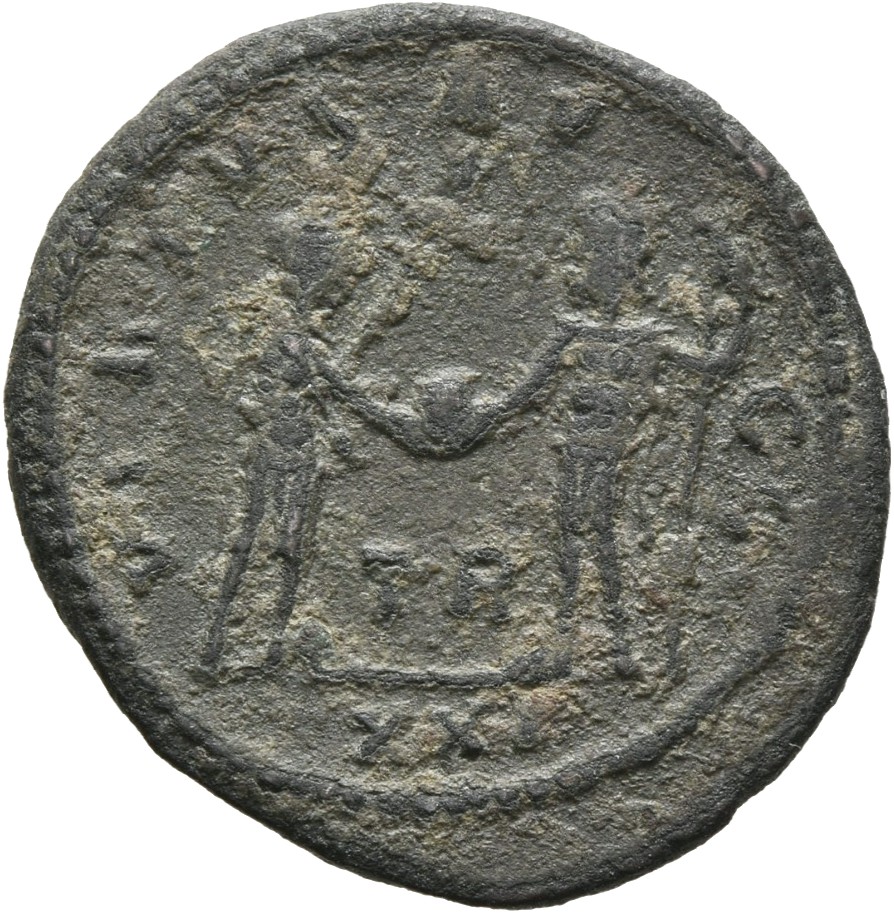 RIC V Carus 380 Carus reverse, Numerian, draped, cuirassed, standing right, holding sceptre in right hand and receiving gl...