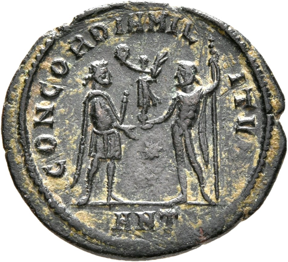 RIC VI Antioch 60b Diocletian reverse, Maximian, draped, cuirassed, standing right, receiving small Victory on globe from ...
