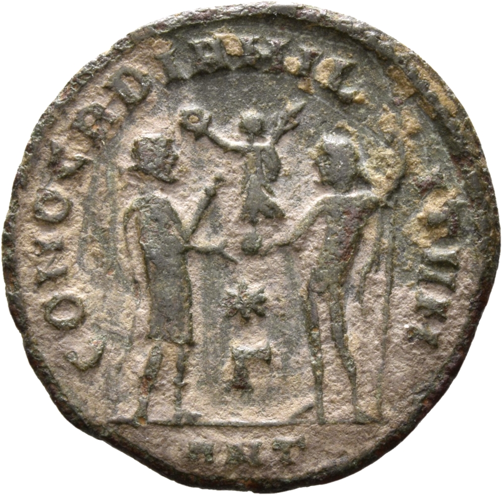 RIC VI Antioch 61b Diocletian reverse — Galerius, draped, cuirassed, standing right, receiving small Victory on globe from...