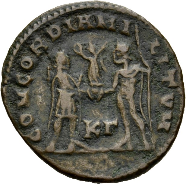 RIC VI Cyzicus 16a Diocletian reverse, Diocletian, draped, cuirassed, standing right, receiving small Victory on globe fro...