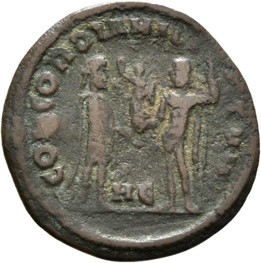 RIC VI Heraclea 13 Diocletian reverse — Diocletian, draped, cuirassed, standing right, receiving small Victory on globe fr...