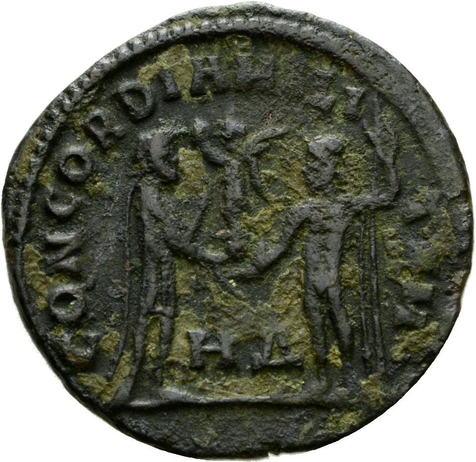 RIC VI Heraclea 22 Diocletian reverse — Maximian, draped, cuirassed, standing right, receiving small Victory on globe from...
