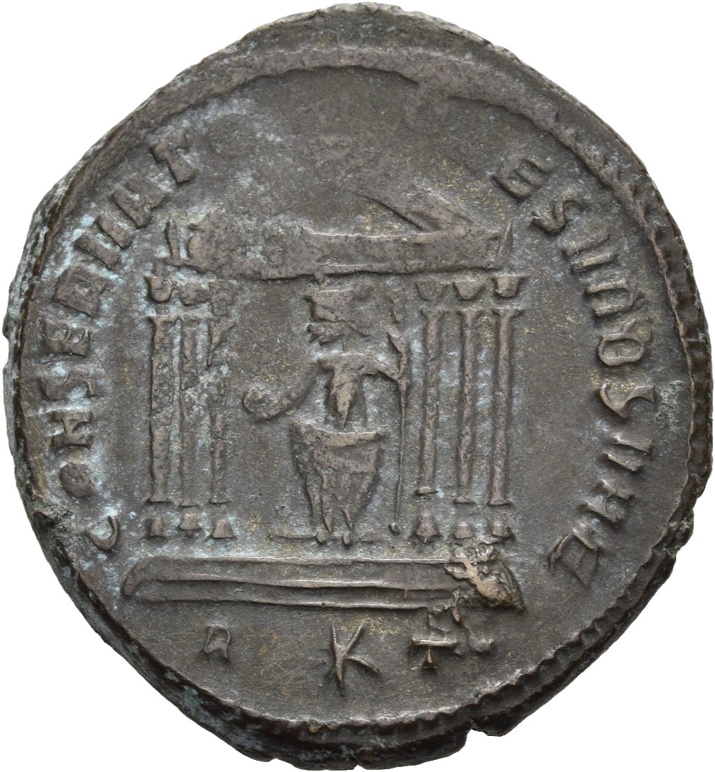 RIC VI Rome 195 Maxentius reverse, Roma, helmeted, draped, seated front, head left, seated front in hexastyle temple, hold...
