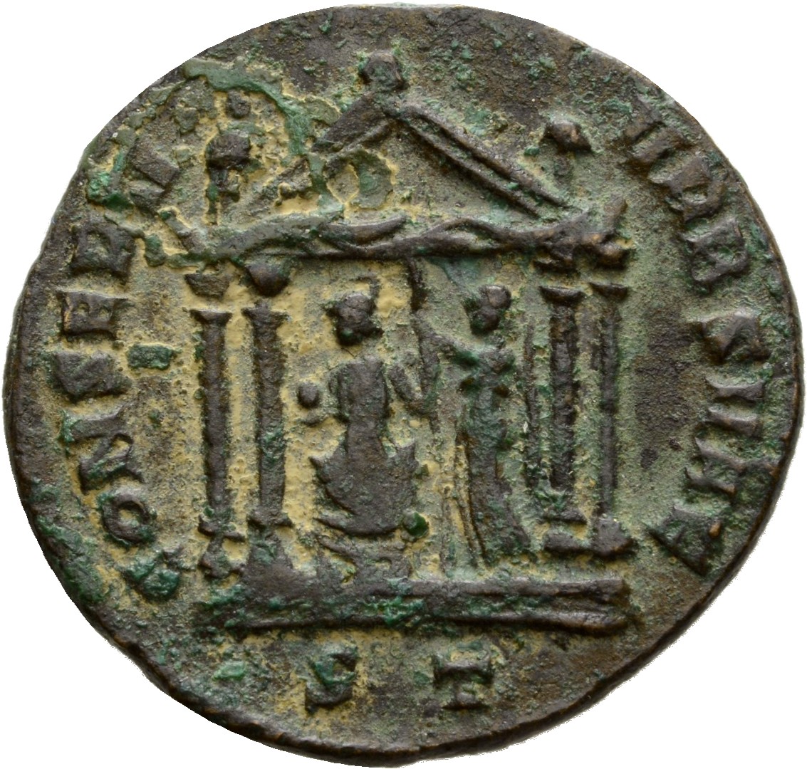 RIC VI Ticinum 108 Maxentius reverse, Victory, winged, draped, standing left, crowning Roma with right hand and holding pa...
