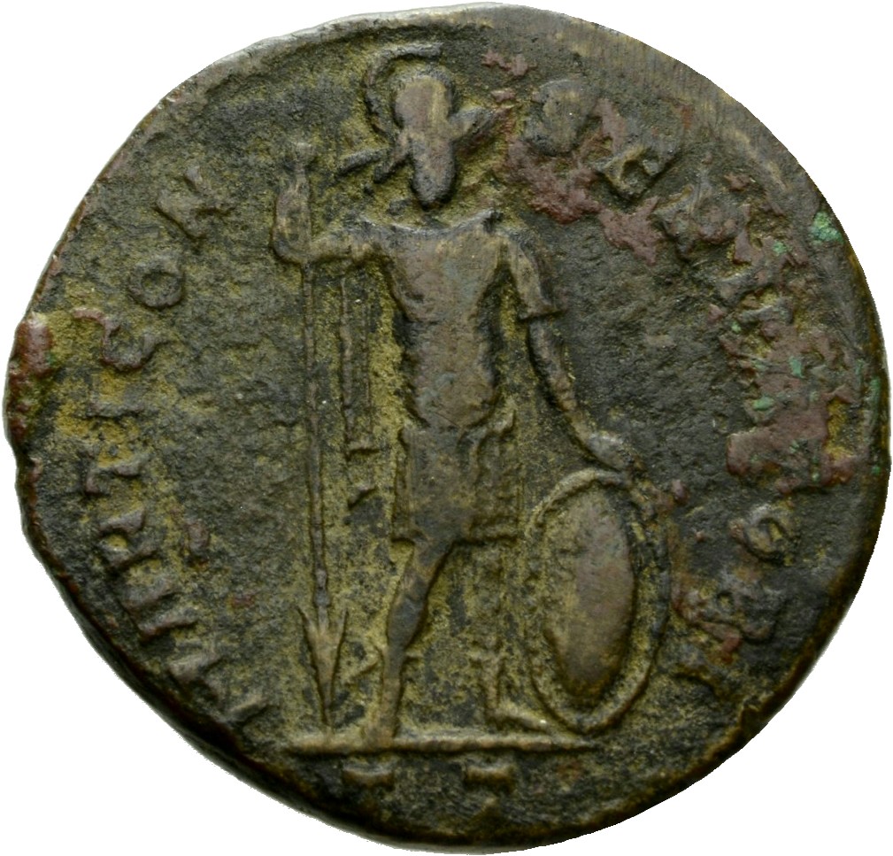 Constantine I reverse — Mars, helmeted, draped, cuirassed, standing front (sometimes head right), leaning on reversed spear with right hand and placing left hand on shield