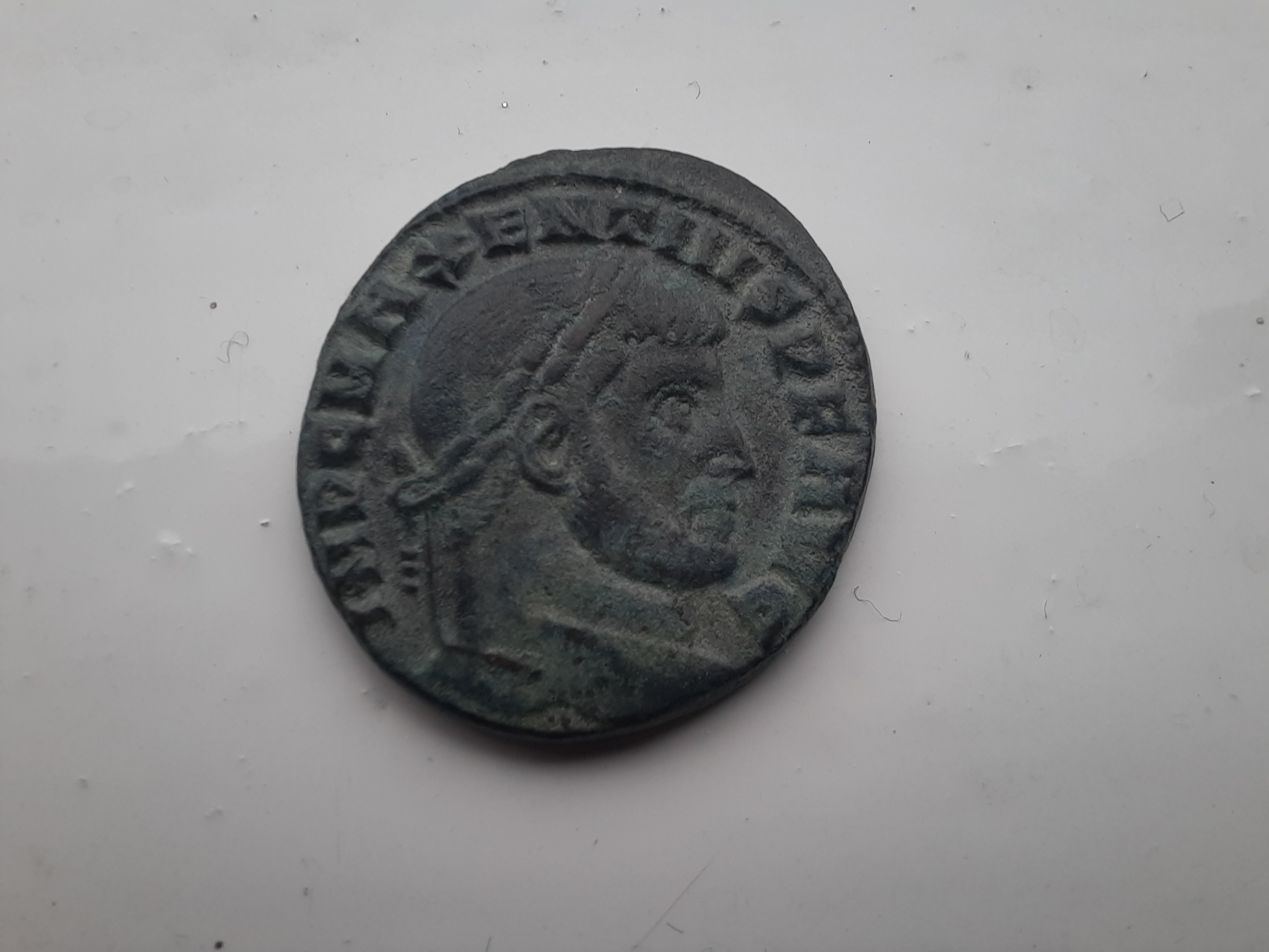 RIC VI Treveri 35 Maximian obverse — Bust of Constntius Chlorus, laureate, wearing imperial mantle, left, holding eagle-ti...