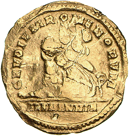 RIC VI Treveri 823 Constantine I reverse, Alamannia, wearing pointed cap, draped, seated left on ground, head low, resting...