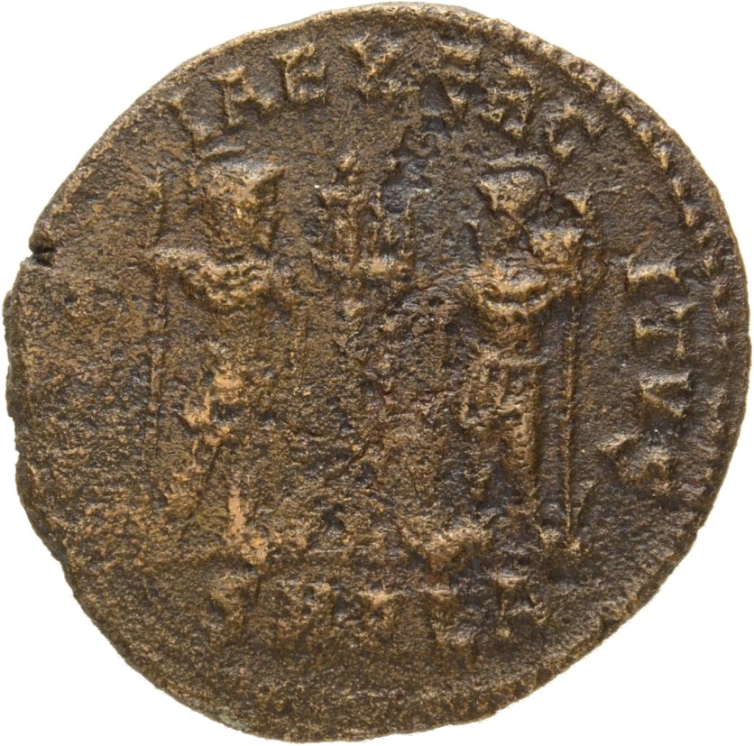 Constantine I reverse — Two soldiers, helmeted, draped, cuirassed, standing facing each other, each holding reversed spear in outer hand and resting inner hand on shield; between them, two standards