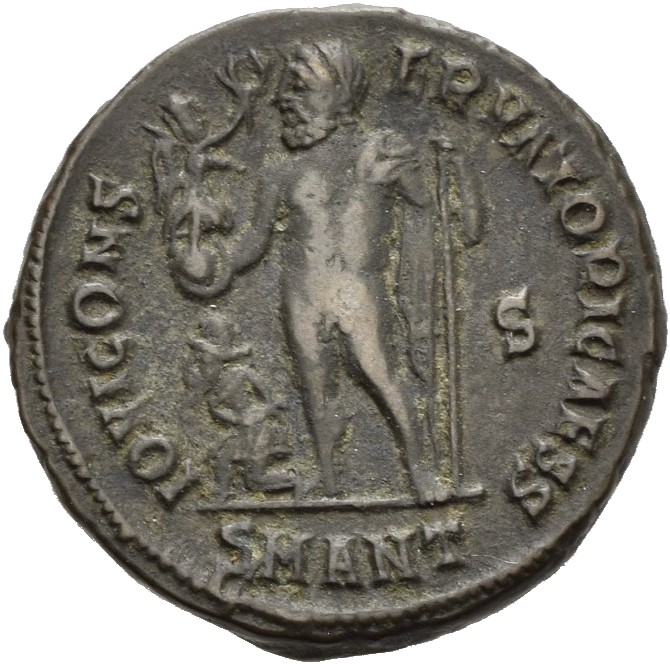 RIC VII Antioch 30 Licinius reverse, Jupiter, nude, chlamys draped across left shoulder, standing left, holding Victory on...