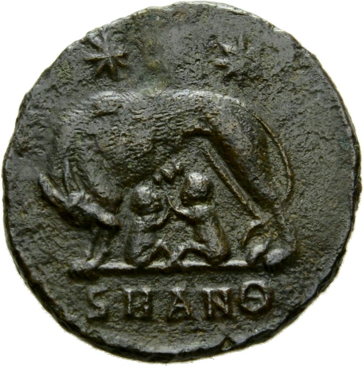 Constantine I reverse — She-wolf, standing left, suckling twins; above, two stars