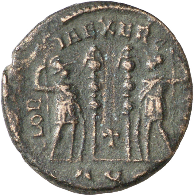 Constantine I reverse — Two soldiers, helmeted, draped, cuirassed, standing facing each other, each holding reversed spear in outer hand and resting inner hand on shield; between them, two standards