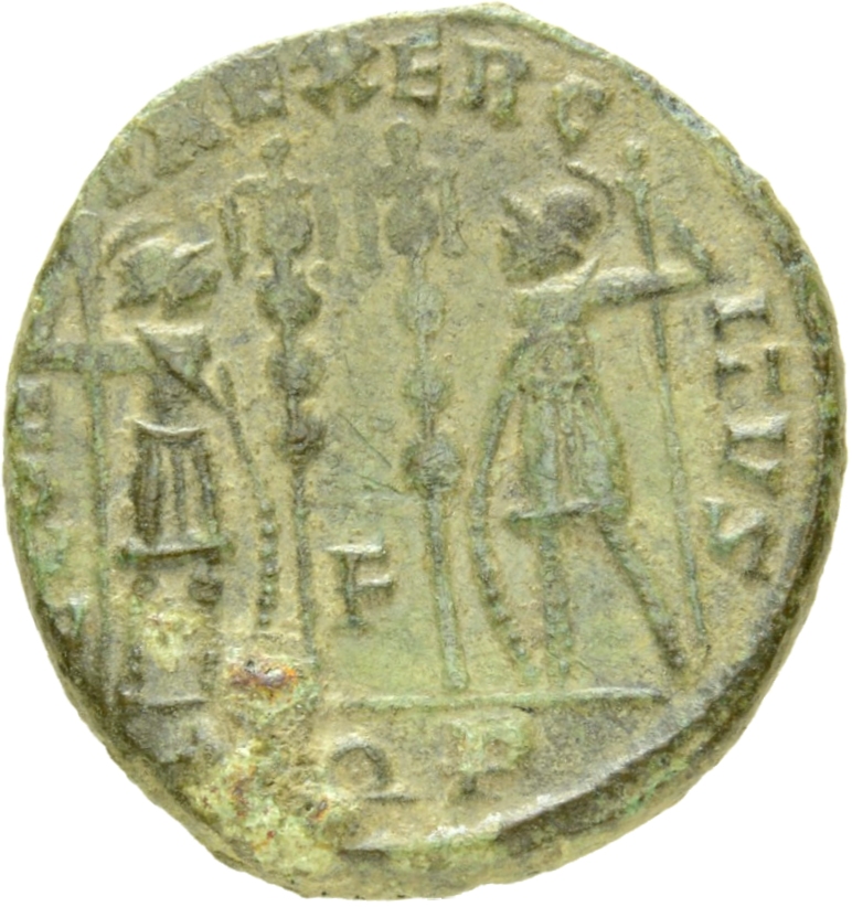 Constantine I reverse — Two soldiers, helmeted, draped, cuirassed, standing facing each other, each holding reversed spear in outer hand and resting inner hand on shield; between them, two standards