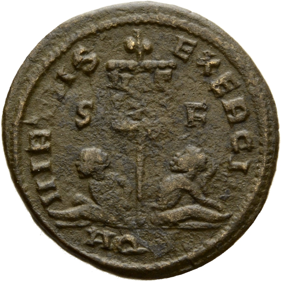 Constantine I reverse — Standard inscribed VOT/X flanked by two seated captives