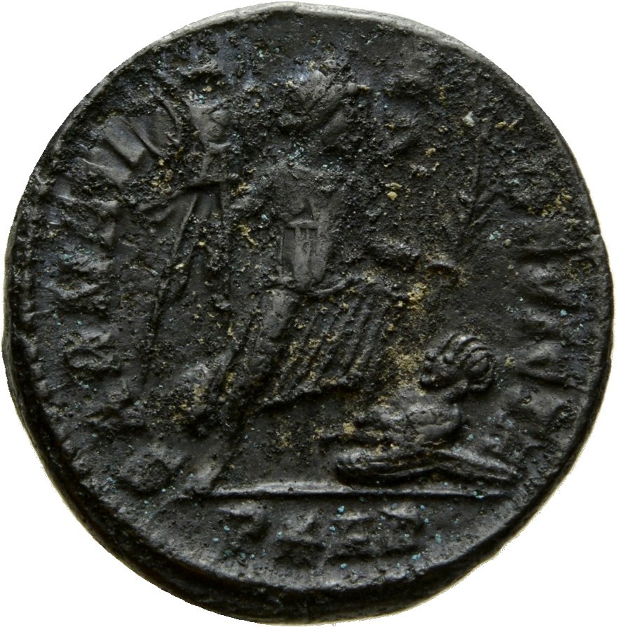 RIC VII Arelate 257 Constantine I reverse — Victory, winged, draped, advancing right, holding trophy in right hand and pal...