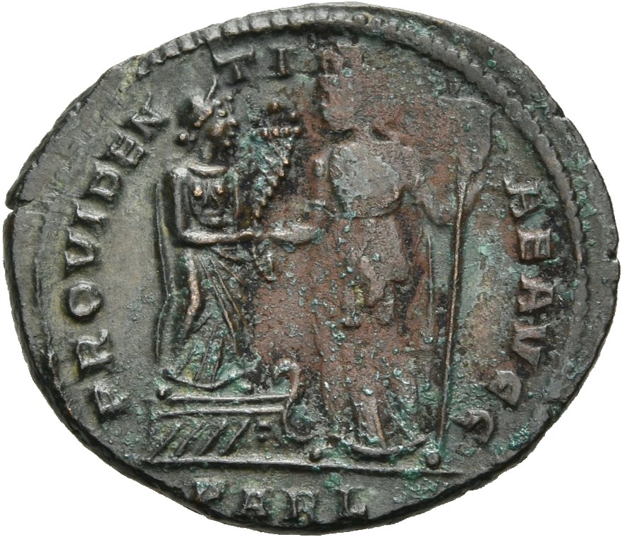 RIC VII Arelate 31 Constantine I reverse, Female figure, draped, standing right on prow, holding cornucopiae in right hand...