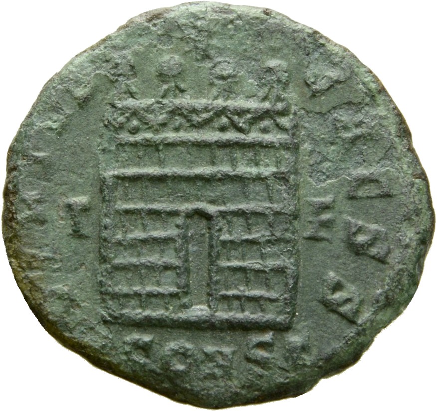 Constantine I reverse — Camp gate with four turrets, without doors, varying number of stone layers; star above