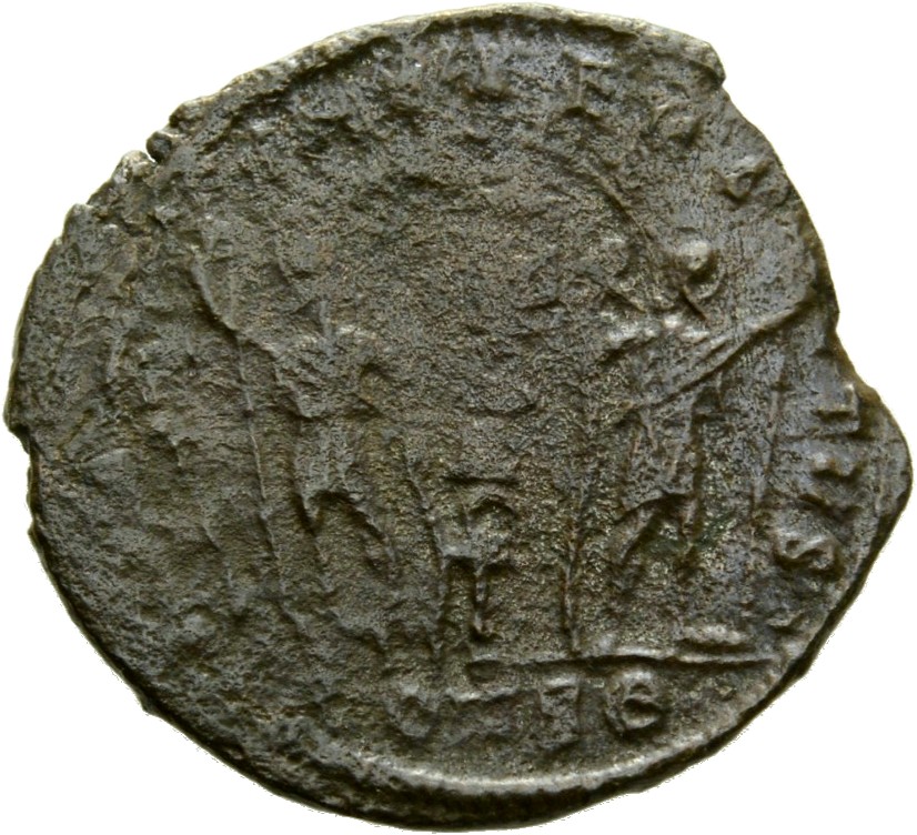 Constantine I reverse — Two soldiers, helmeted, draped, cuirassed, standing facing each other, each holding reversed spear in outer hand and resting inner hand on shield; between them, a standard