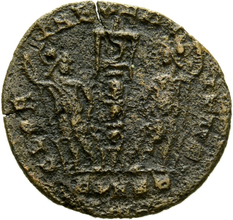 Constantine I reverse — Two soldiers, helmeted, draped, cuirassed, standing facing each other, each holding reversed spear in outer hand and resting inner hand on shield; between them, a standard