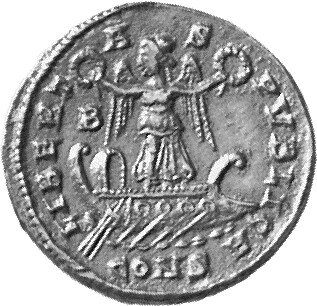 Constantine I reverse — Victory, winged, draped, standing left on galley, holding a wreath in both hands