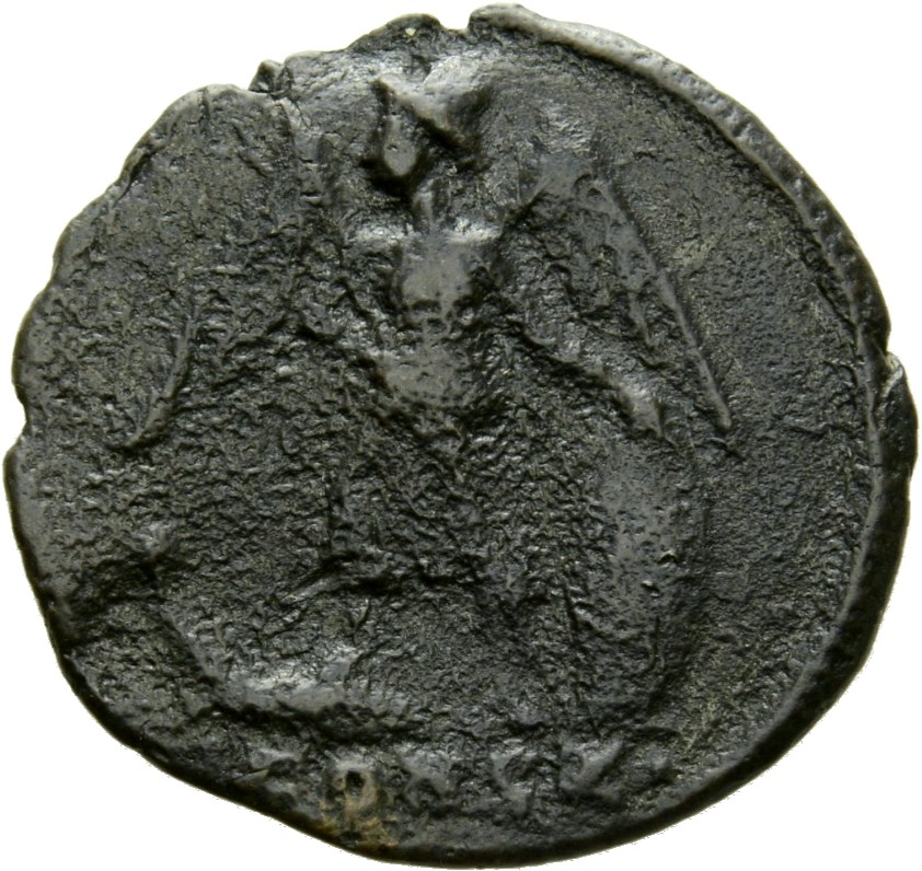 Constantine I reverse — Victory, winged, draped, standing left on prow, holding spear in right hand and shield in left hand