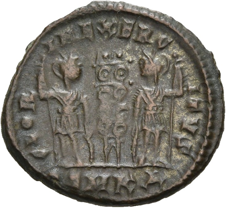 RIC VII Cyzicus 101 Constantine I reverse, Two soldiers, helmeted, draped, cuirassed, standing facing each other, each hol...