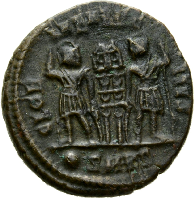 Constantine I reverse — Two soldiers, helmeted, draped, cuirassed, standing facing each other, each holding spear in outer hand and resting inner hand on shield; between them, two standards