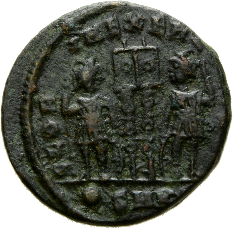 Constantine I reverse — Two soldiers, helmeted, draped, cuirassed, standing facing each other, each holding spear in outer hand and resting inner hand on shield; between them, two standards