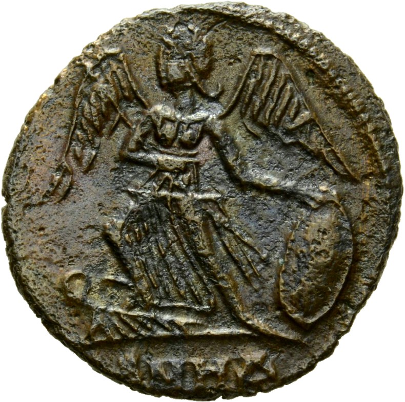 Constantine I reverse — Victory, winged, draped, standing left on prow, holding spear in right hand and shield in left hand