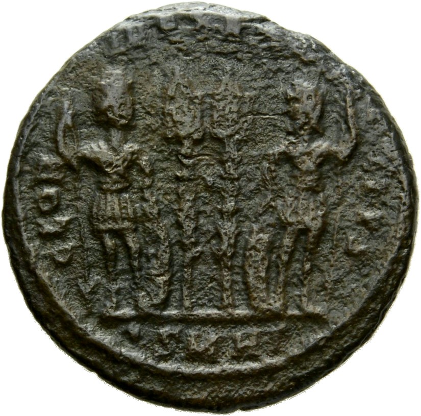 Constantine I reverse — Two soldiers, helmeted, draped, cuirassed, standing facing each other, each holding spear in outer hand and resting inner hand on shield; between them, two standards