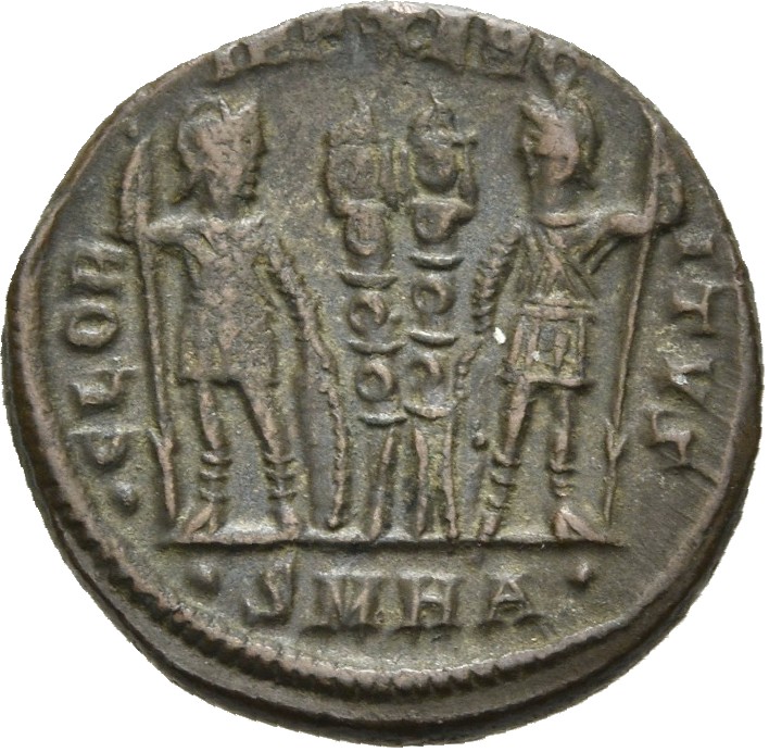 RIC VII Heraclea 123 Constantine I reverse, Two soldiers, helmeted, draped, cuirassed, standing facing each other, each ho...