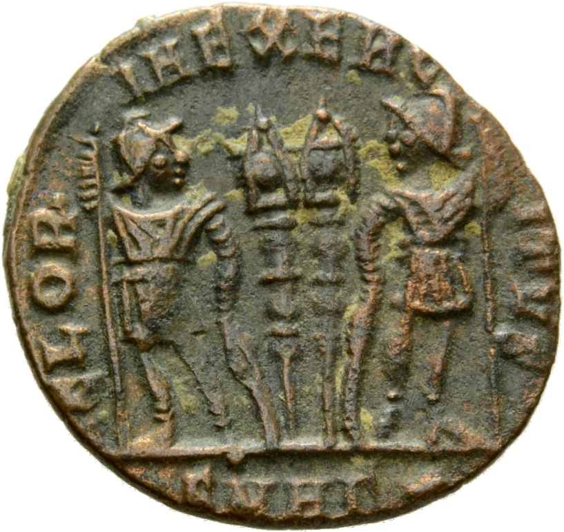 Constantine I reverse — Two soldiers, helmeted, draped, cuirassed, standing facing each other, each holding spear in outer hand and resting inner hand on shield; between them, two standards