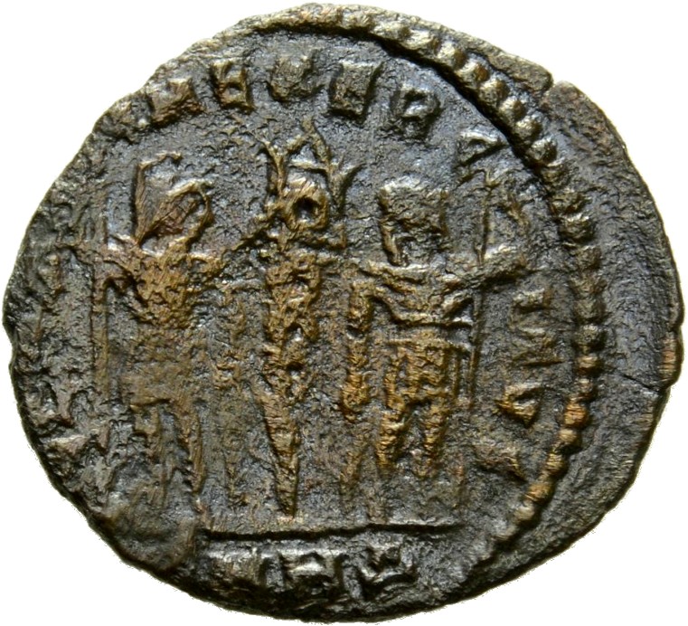 Constantine I reverse — Two soldiers, helmeted, draped, cuirassed, standing facing each other, each holding spear in outer hand and resting inner hand on shield; between them, a standard