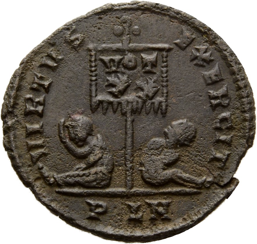 Constantine I reverse — Standard inscribed VOT/XX flanked by two seated captives