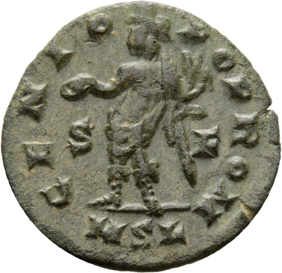 Constantine I reverse — Genius, wearing modius, draped with himation, standing left, holding patera in right hand and cornucopiae in left hand