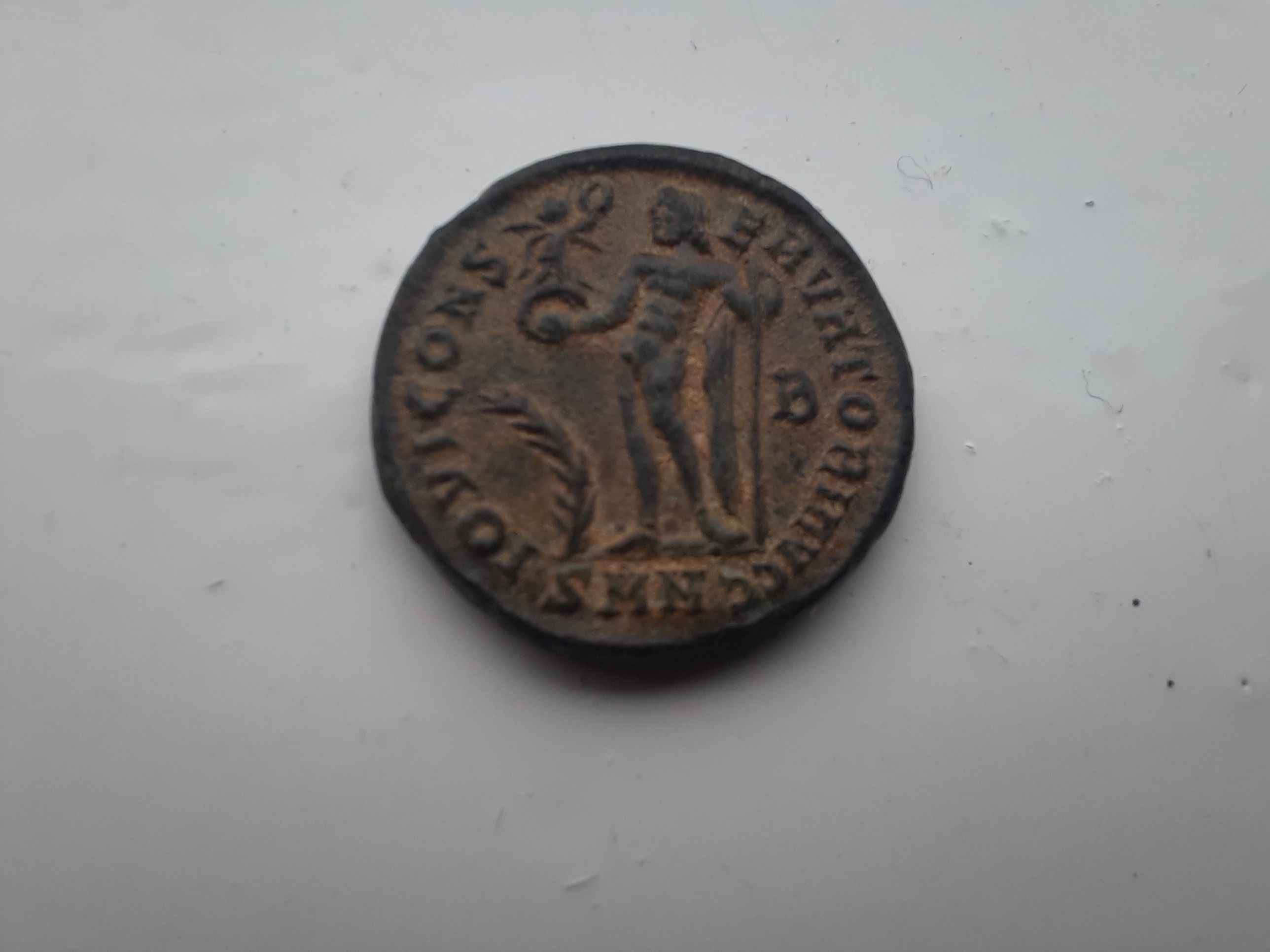 RIC VII Lugdunum 24 Constantine I obverse, Bust of Constantine I, laureate, wearing trabea, left, holding eagle-tipped sce...