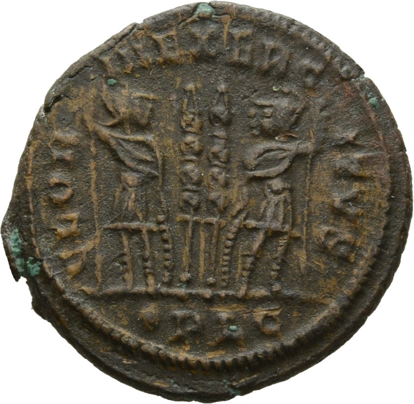 RIC VII Lugdunum 243 Constantine I reverse, Two soldiers, helmeted, draped, cuirassed, standing facing each other, each ho...