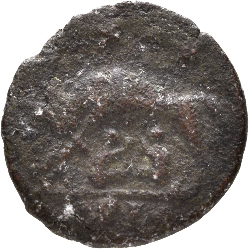 Constantine I reverse — She-wolf, standing left, suckling twins; above, two stars