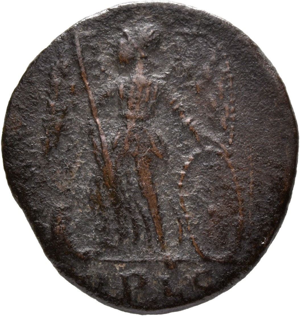Constantine I reverse — Victory, winged, draped, standing left on prow, holding spear in right hand and shield in left hand