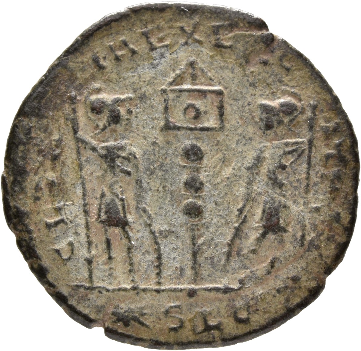 RIC VII Lugdunum 281 Constantine I reverse, Two soldiers, helmeted, draped, cuirassed, standing facing each other, each ho...