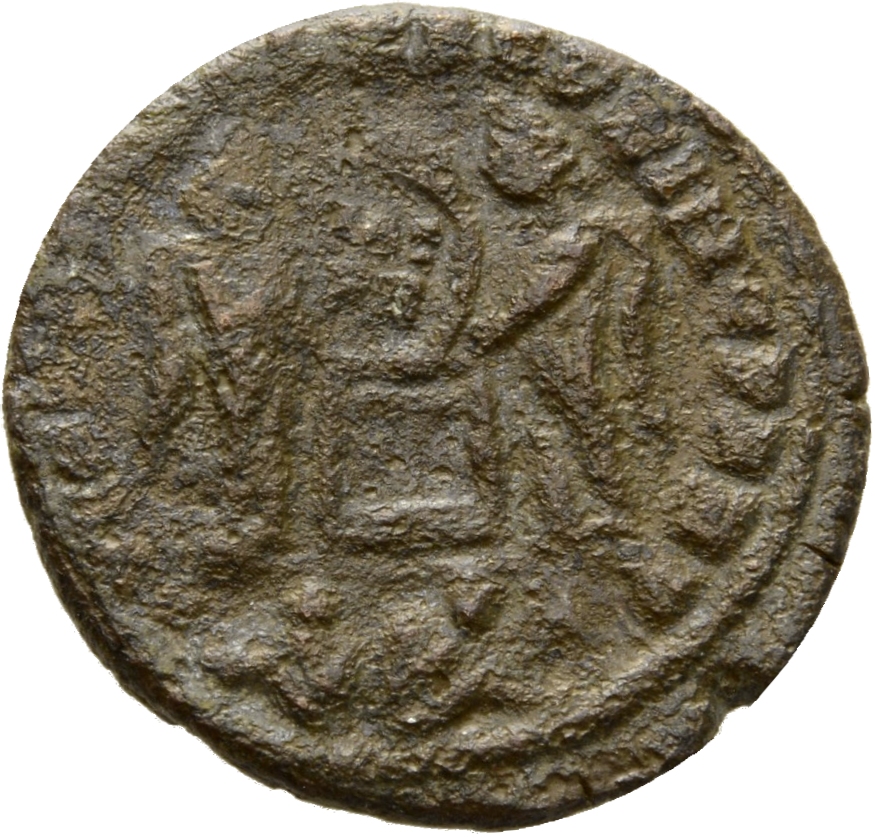 Constantine I reverse — Two Victories, winged, draped, facing each other, holding a shield inscribed VOT/PR supported by an altar