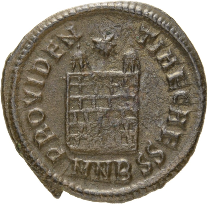 Constantine I reverse — Camp gate with two turrets, without doors, with varying number of stone layers; star above