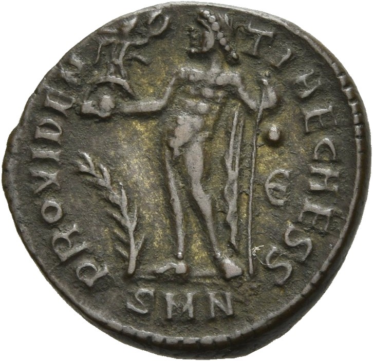RIC VII Nicomedia 34 Licinius reverse, Jupiter, nude, chlamys draped across left shoulder, standing left, holding Victory ...