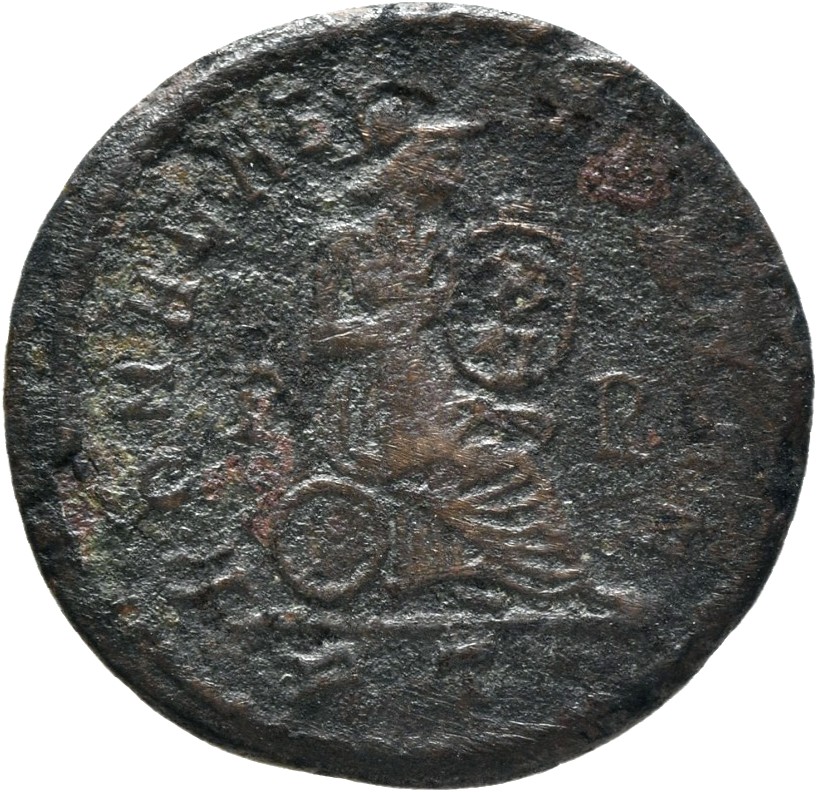 RIC VII Rome 156 Licinius reverse, Roma, helmeted, draped, seated right, holding shield in lap inscribed X/V