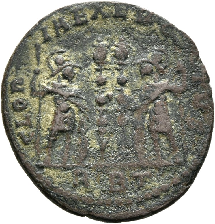 RIC VII Rome 337 Constantine I reverse, Two soldiers, helmeted, draped, cuirassed, standing facing each other, each holdin...