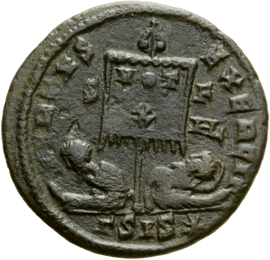 Constantine I reverse — Standard inscribed VOT/X flanked by two seated captives