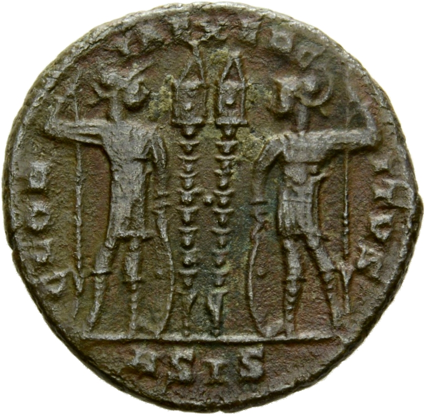 Constantine I reverse — Two soldiers, helmeted, draped, cuirassed, standing facing each other, each holding spear in outer hand and resting inner hand on shield; between them, two standards