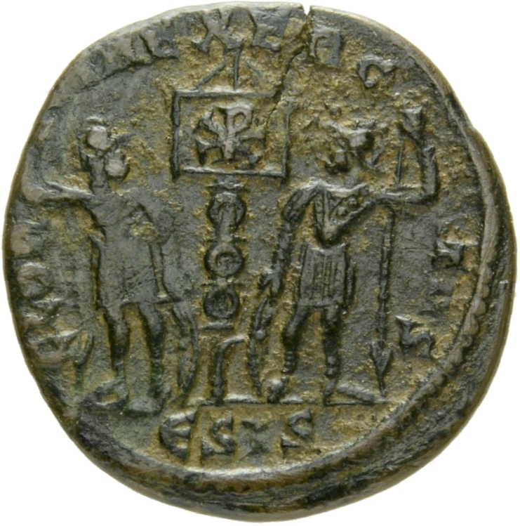 Constantine I reverse — Two soldiers, helmeted, draped, cuirassed, standing facing each other, each holding reversed spear in outer hand and resting inner hand on shield; between them, a standard