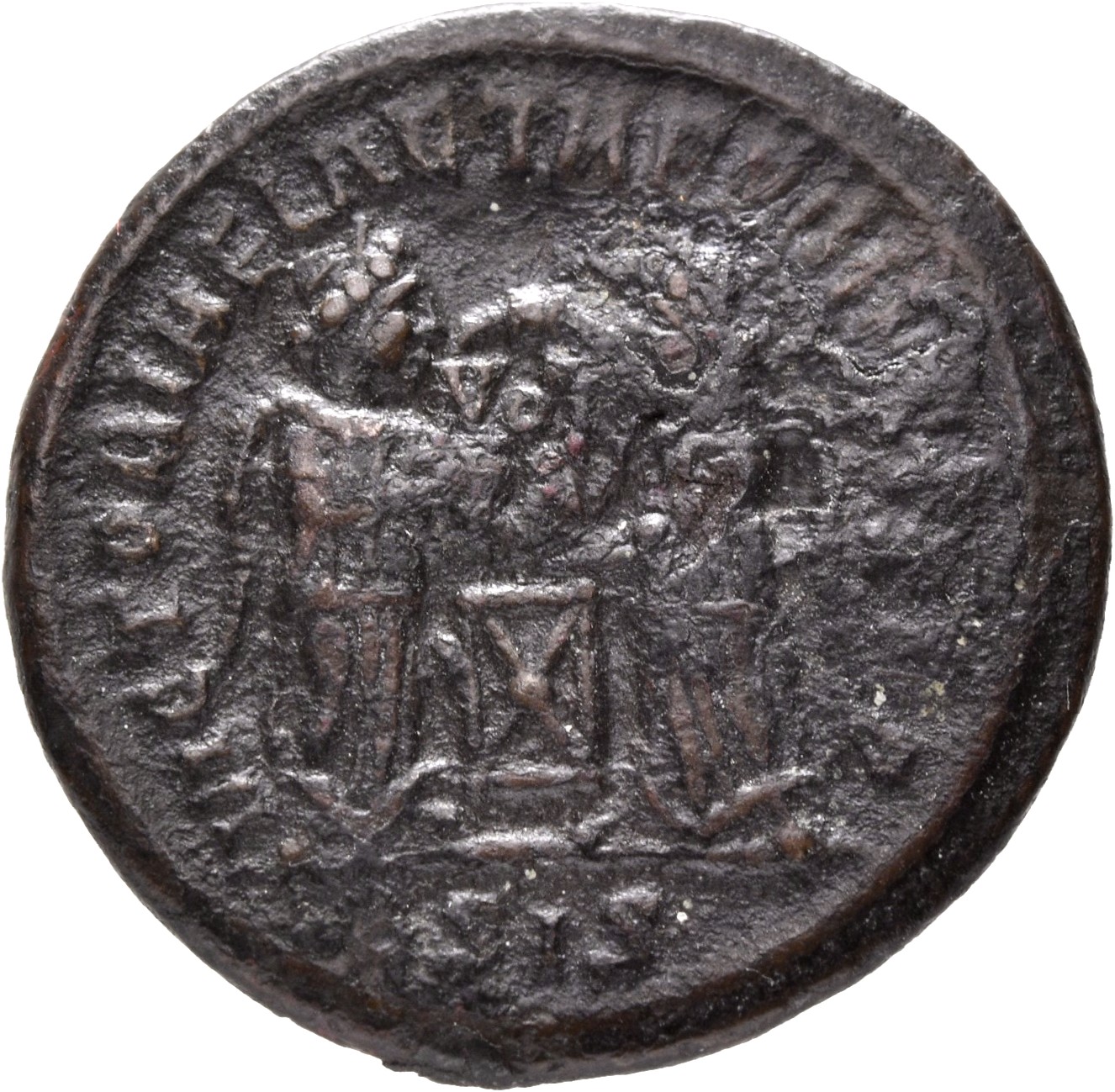 RIC VII Siscia 55 Constantine I reverse, Two Victories, winged, draped, facing each other, holding a shield inscribed VOT/...
